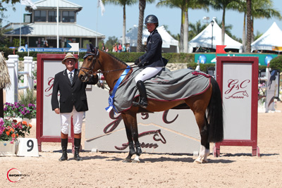 Lauren Hough and Ohlala in their winning presentation with ringmaster Cliff Haines. Photo © Sportfot. 