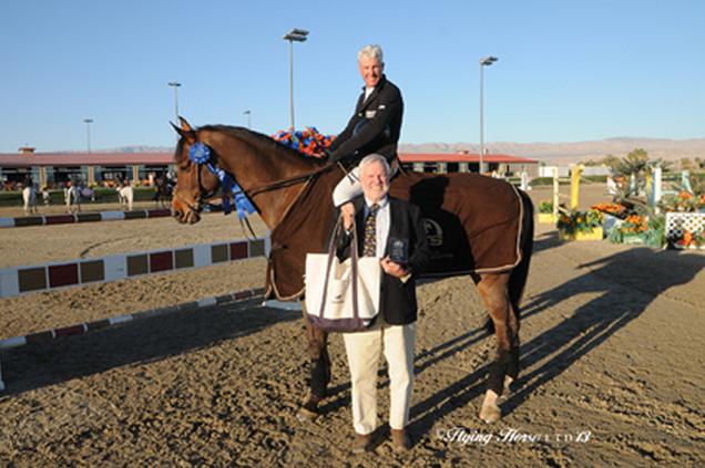 ©Flying Horse Photography HITS’ Tony Hitchcock presents winner’s awards to Rich Fellers (aboard his other mount McGuinness) after his win in the $25,000 SmartPak Grand Prix, presented by Zoetis, on Flexible.