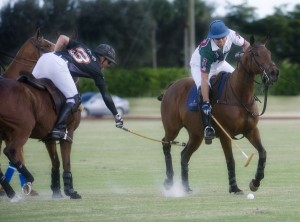 Casablanca's Mike Azzaro (3) tries to steal the ball away from Palm Beach Equine's Luis Escobar (3). Photo by Scott Fisher