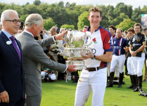 New grandfather Prince Charles awards the Westchester Cup to England team captain Luke Tomlinson. Photos courtesy of Audi International