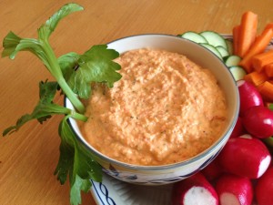 Roasted red pepper hummus is vibrant and full of flavor.