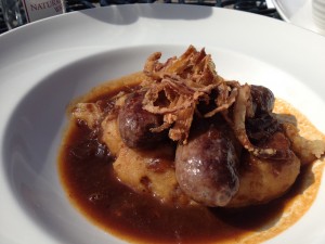 Bangers and mash at The Pleasure Gardens Deli at Blenheim Palace. English beef and ale bangers with caramelized onion mash. 