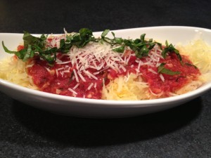 Spaghetti squash with a fresh tomato sauce is an ideal healthy meal or side dish that tastes super delicious too!
