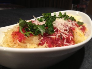 Spaghetti Squash with a sprinkling of basil and parmesan (optional).