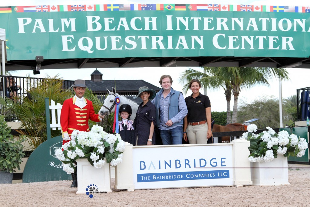 GumBits creator Shereen Fuqua, her husband Jeff, and daughter Kat are active in the equestrian world (from left to right: Kat Fuqua, Shereen Fuqua, Jeff Fuqua, and Elise Fraza) (Photo courtesy of Anne Gittins Photography)