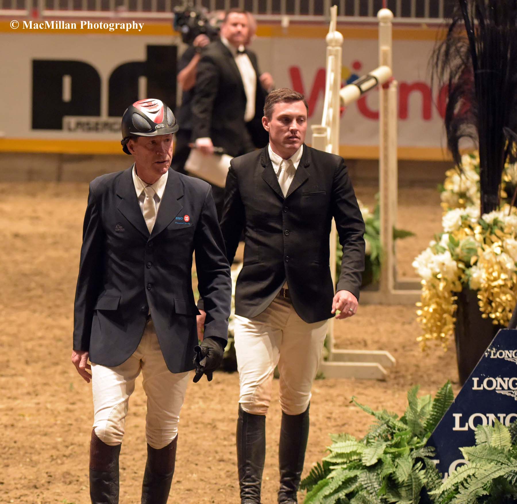Photo 9 – Canadian jumper rider stars Ian Millar (foreground) and Chris Sorenson on their course walk before the $75,000 Big Ben Challenge at the 2015 Royal Winter Fair. Millar is known affectionately as “Captain Canada” having ridden in ten Olympic Games representing Canada thus far.Photo by Kim MacMillan/MacMillan Photography