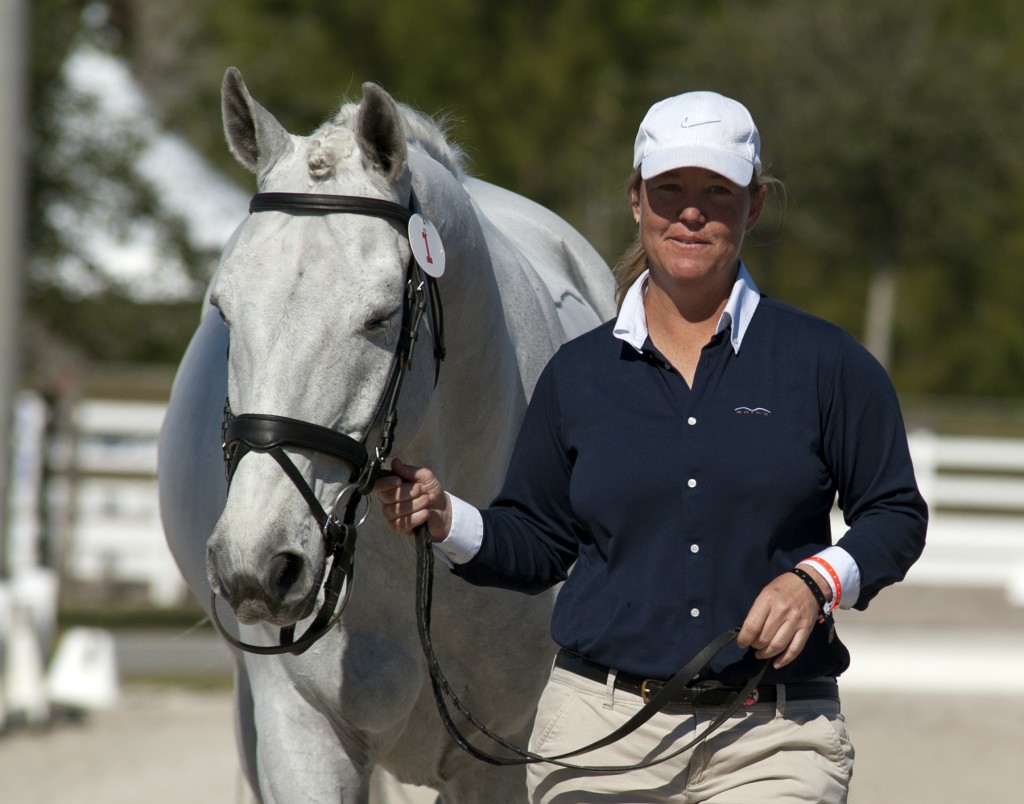 A relaxed Jacqueline Brooks and “Goose” under the Florida sun in the jog at the 2013 World Dressage Masters competition. Photo by Kim MacMillan/MacMillan Photography
