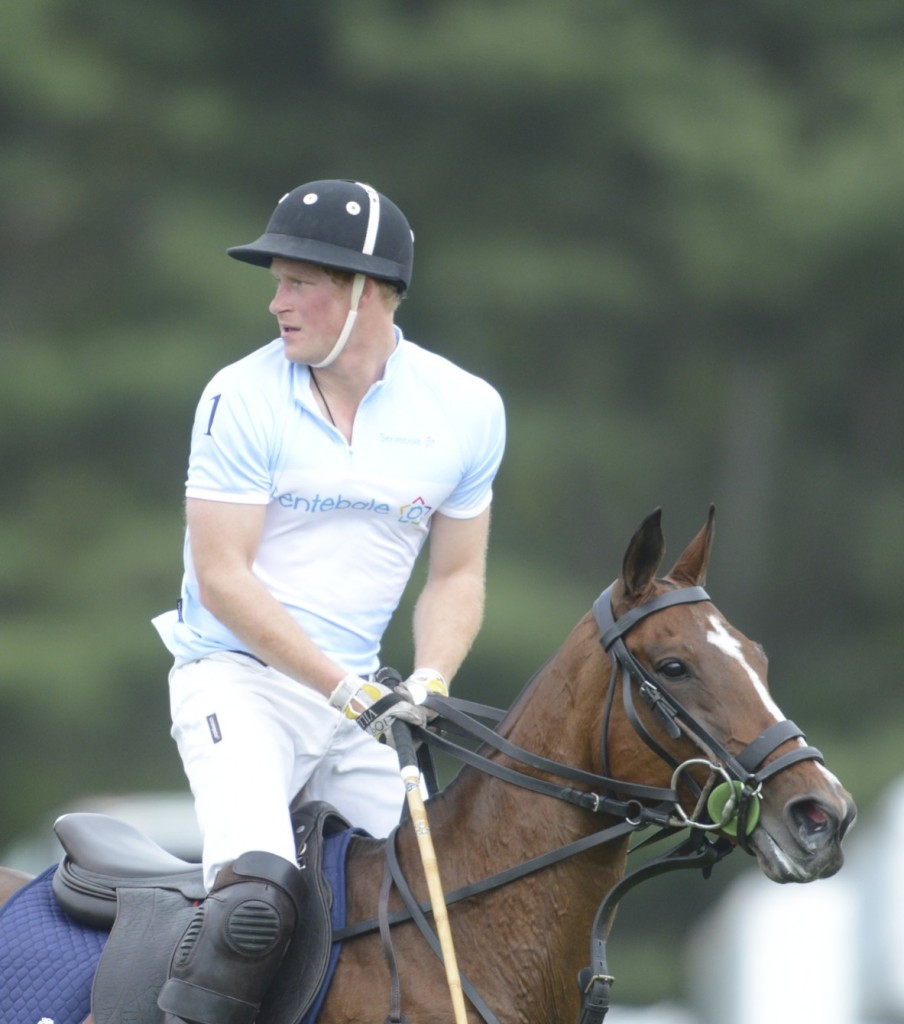 Prince Harry competing at the Sentebale Royal Salute Polo Club in Greenwich, Connecticut. Photo by John Robben