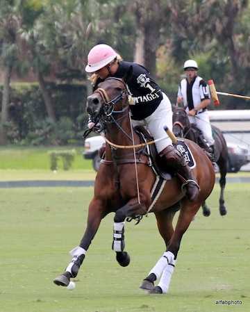Melissa Ganzi wears her trademark pink polo helmet when competing. Photo by Alan Fabricant 