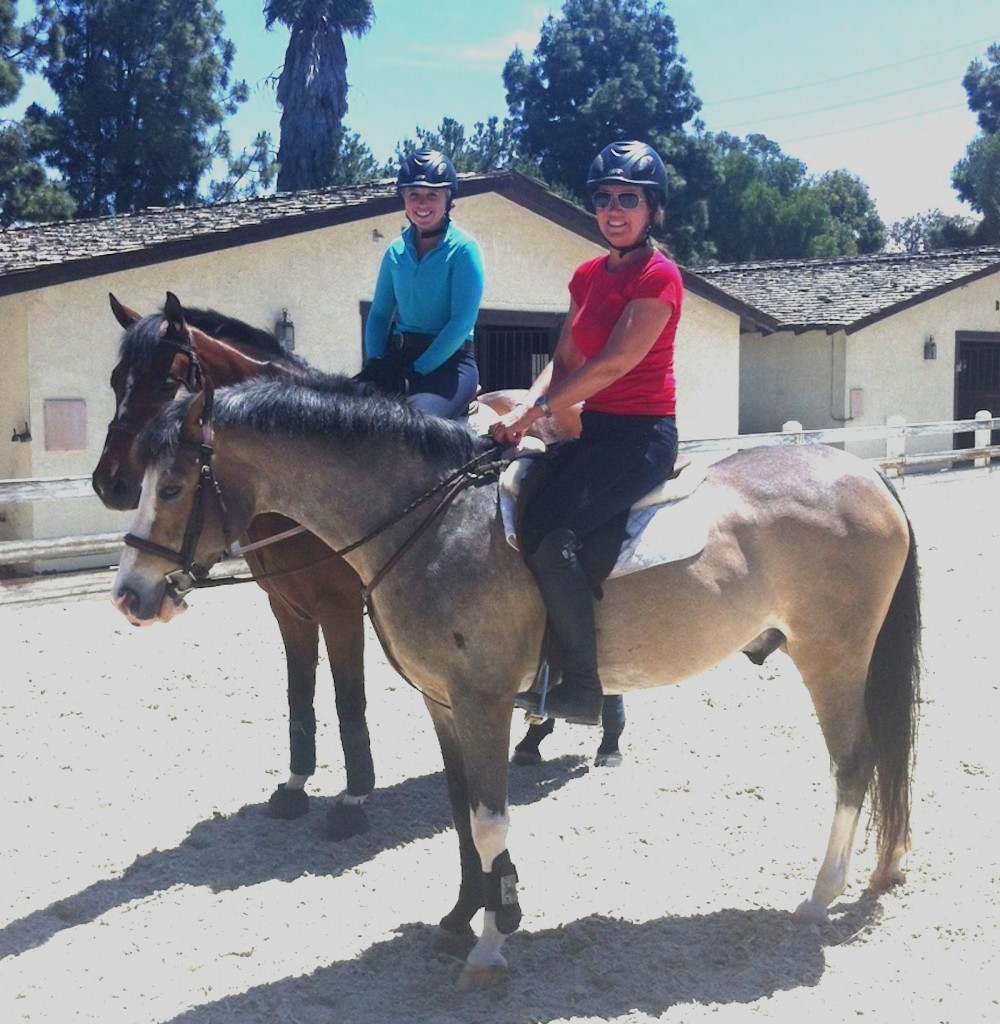 Devon’s first ride took place only 12 weeks after the horrific fall that broke her neck and back, leaving her paralyzed from the neck down. She started driving and teaching again 10 weeks into recovery. Shown here, on this momentous occasion, aboard Popsicle, owned by Pam Griswold, with Kylee Arbuckle for company. Photo courtesy of Christy Arbuckle