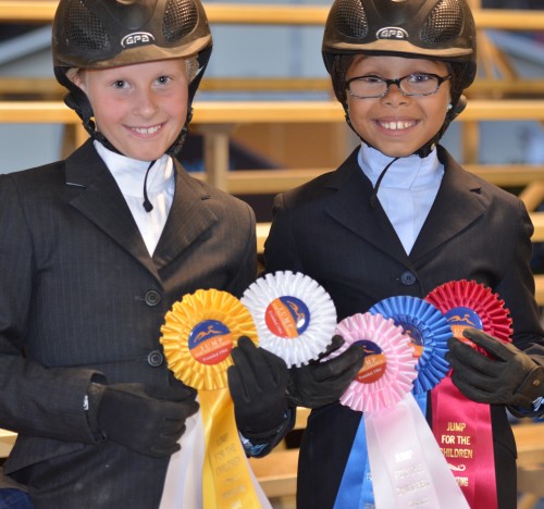 Young competitors show off their ribbons during the 2012 Jump for the Children Horse Show.