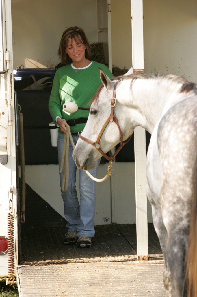 The goal of On Target Training is calm, happy, relaxed horses and people – using positive reinforcement. Shawna helps this horse to view a trailer as a good thing, not an object of fear, pain and worry, during a clinic in Southern Pines. Photo by Bernard Schnake
