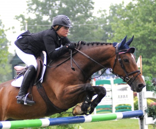 Don Juan does hunters and grand prix jumpers, shown here with Tori in the first round of the 2013 Upperville Jumper Classic. Photo By Lauren R. Giannini 