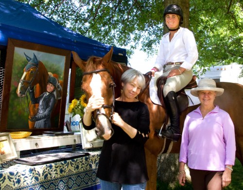 Monsieur du Reverdy, artist Linda Luster, Tori Colvin (in saddle), and Karen Long Dwight who commissioned the duo’s portrait which is visible on the left, unveiled at the 2013 Upperville Horse Show. Photo by Brigid Colvin  