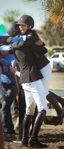 Nayel hugging and congratulating his good friend Ashlee Bond Clarke following their winning rounds at the AIG $1 Million Grand Prix at HITS Thermal.