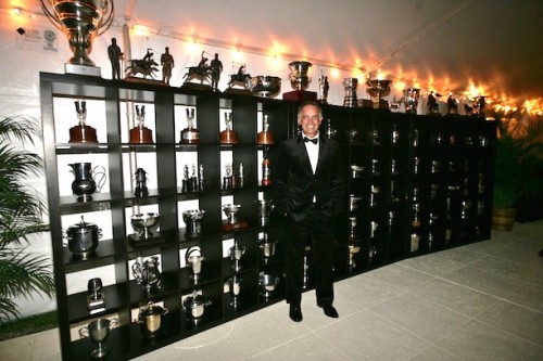 When Carlos was inducted into the Museum of Polo and Hall of Fame, the museum set up a display of his trophies in the marquee – a display that filled an entire wall. Photo by Alex Pacheco