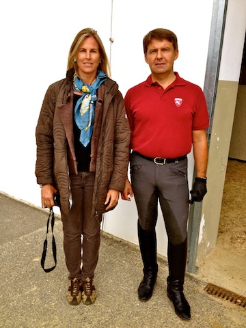 After her first day, Chief Rider Andreas Hausberger and Suzie pause at the Heldenberg training facility before heading to the tea room.