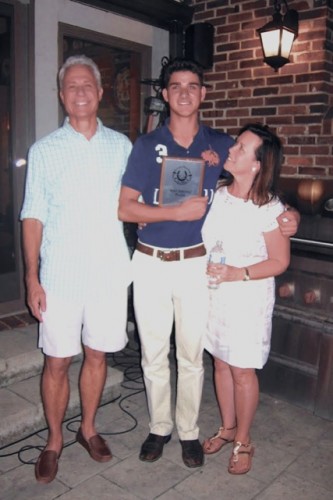 Bob and Suzanne Ebel with Alex after he received the 2014 Most Improved Player award from the St. Louis Polo Club. Photo by Cindy Allen/St. Louis Polo Club 