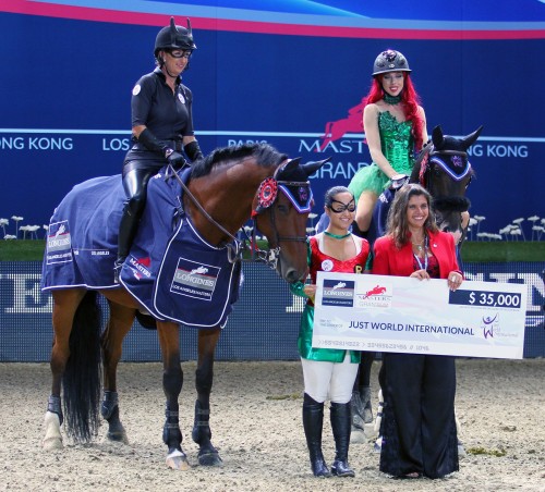 As a JustWorld Ambassador, Laura, left, shows off her inner Catwoman during the charity class at the Longines Los Angeles Masters along with fellow JustWorld Ambassador Hannah Selleck. Photo by Kendall Bierer/Phelps Media