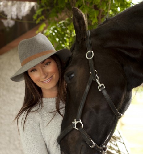 CEO and designer of Asmar Equestrian, Noel Asmar, with her Friesian, Jake