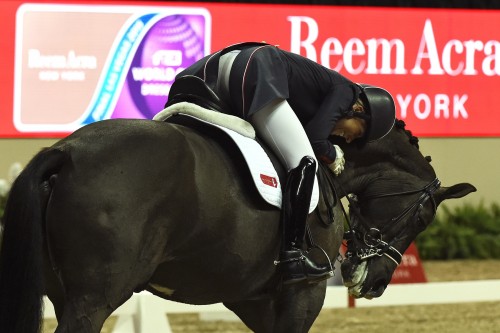Charlotte celebrates with Blueberry during the 2015 World Cup Las Vegas.
