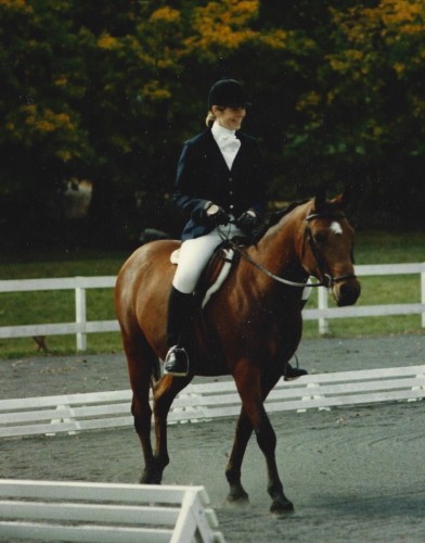 Lori, in the 80s, competing on her Arabian Stormy.