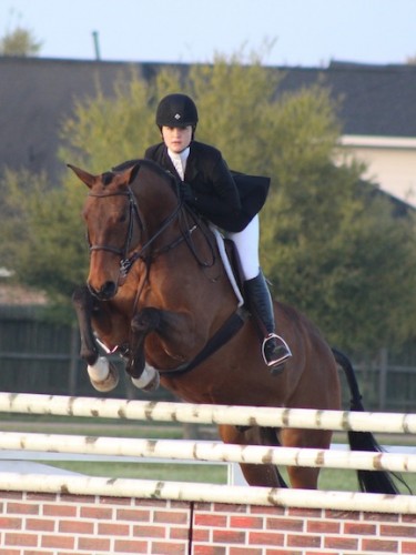 Lizzie riding Bull Run’s Rubicon in an equitation class