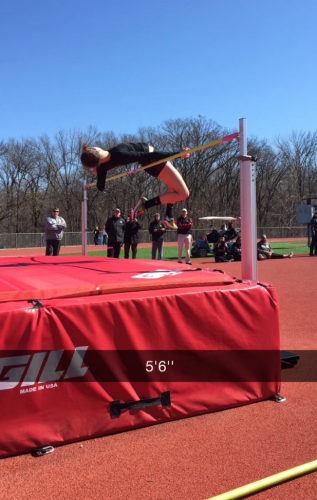 Clearing the bar during the high jump