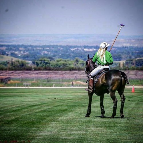 Kerstie playing polo at the Big Horn Polo Club in Sheridan, Wyoming. Photo by Kim Campbell
