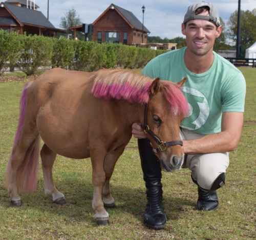 Josh Dolan and his mini Peeps, who sports a cute pink mane and tail.