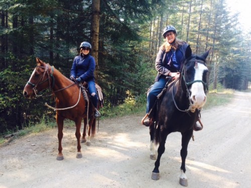 Jan, right, on Oreo and her daughter, Abby Westmark, on Doc. Riding at the Red Horse Mountain Ranch for a week gave Jan the itch to ride as often as possible during 2016.