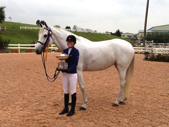 Alden Moylan and sale horse, Viola, winning the Grand Champion Amateur Owner Hunter award at Lexington Spring Premiere in 2013. Photo by Gavin Moylan
