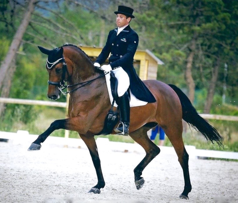 Jaime truly represents the “world” of dressage. Photo courtesy of Myriam Ranchon