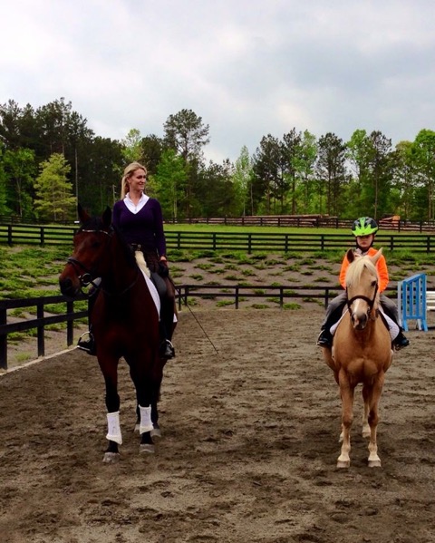 Stephanie’s son, Connor, rides beside her and Clever on his pony, Maple. Photo courtesy of Stephanie Hartigan 