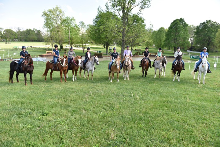 Sidelines photographer Becky Cole, far right, riding the Rolex cross-country course on Pocahontas. Photo courtesy of Rolex