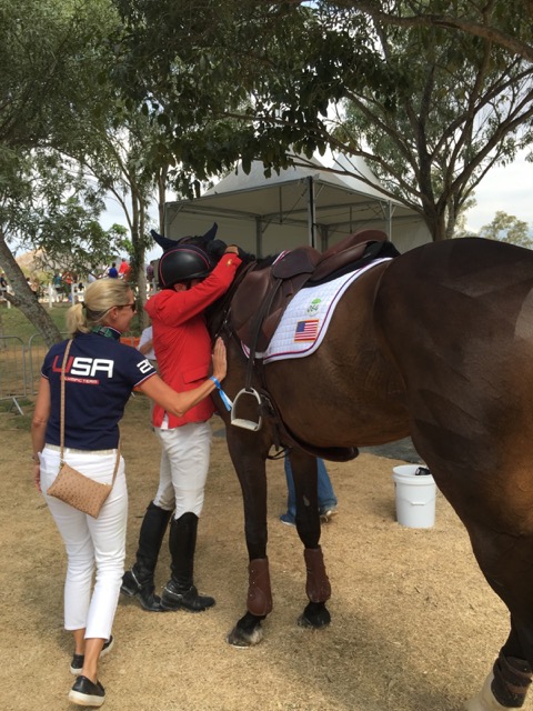 Phillip, hugging Mighty Nice, and wife Evie Dutton reacting to the news that they just won the individual bronze medal.  Photo by Caroline Moran