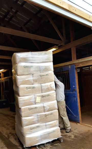 Reaching the top of the shavings pile can be a challenge. And if you don’t have scissors to cut the bags open, the task becomes even more difficult — and often comical.