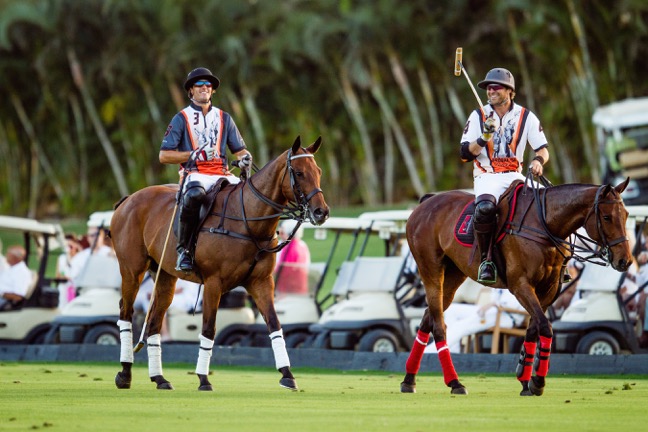 Nic (left) and Brandon Phillips share a light moment between chukkers at the 2016 Nic Roldan’s Sunset Polo & White Party to benefit Brooke USA. Nic and Brandon are business partners in Bedford Park, a company that designs and builds equestrian facilities. Photo by Juan Lamarca, <a href=