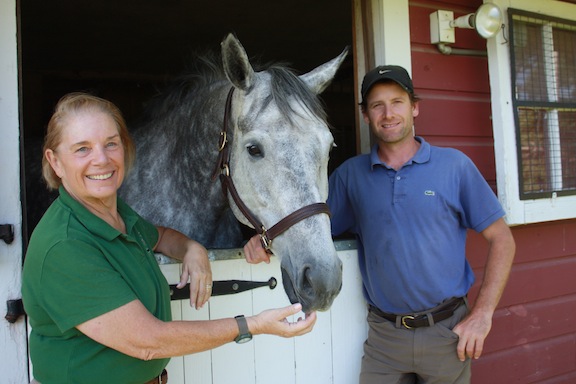 Fernanda and Fitch's Corner manager Nick Meyers with Buzz. (Photo by Rebecca Baldridge)
