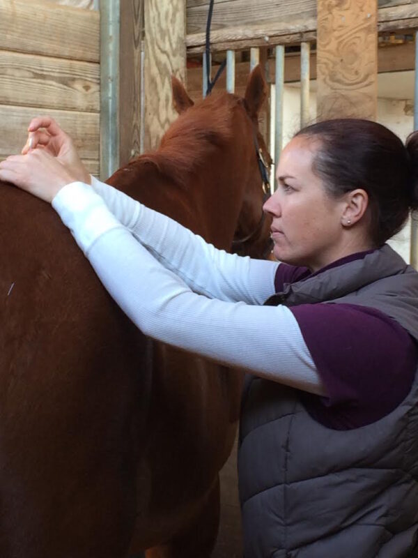 Grace performing acupuncture Photo courtesy of Grace Buchanan