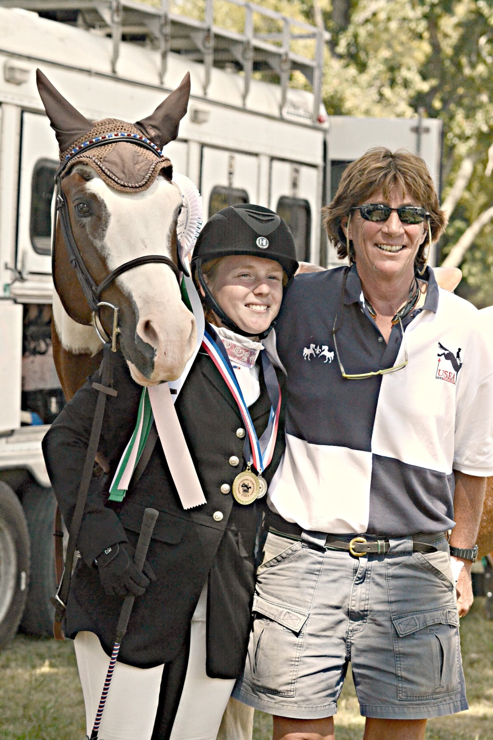Cathy with student Bobbie Jones and Rebel’s Heartbreaker, who earned fourth out of 31 starters in Novice Junior at the 2014 American Eventing Championships. (Photo by JJ Sillman Photography)