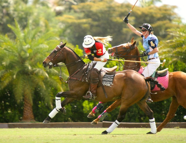 Pepsi and Kerstie — mallet in right hand, reins in the left. (Photo by Sheryel Aschfort, The Polo Paparazzi)