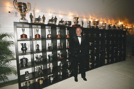A man and his trophies - Carlos Gracida standing in front of an impressive display of just some of the trophies he has won around the world - part of a one night exhibit at the Museum set up specially for his induction into the Hall of Fame
