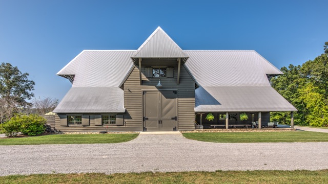 Bobby McAlpine designed this barn outside of Nashville, Tennessee, for clients who wanted living space as well as entertaining areas that could accommodate large parties. Photo by Bruce Cain of Elevated Lens Photography