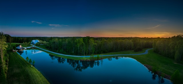 Barn and guest house in Tennessee — designed by Bobby McAlpine Photo by Bruce Cain of Elevated Lens Photography 