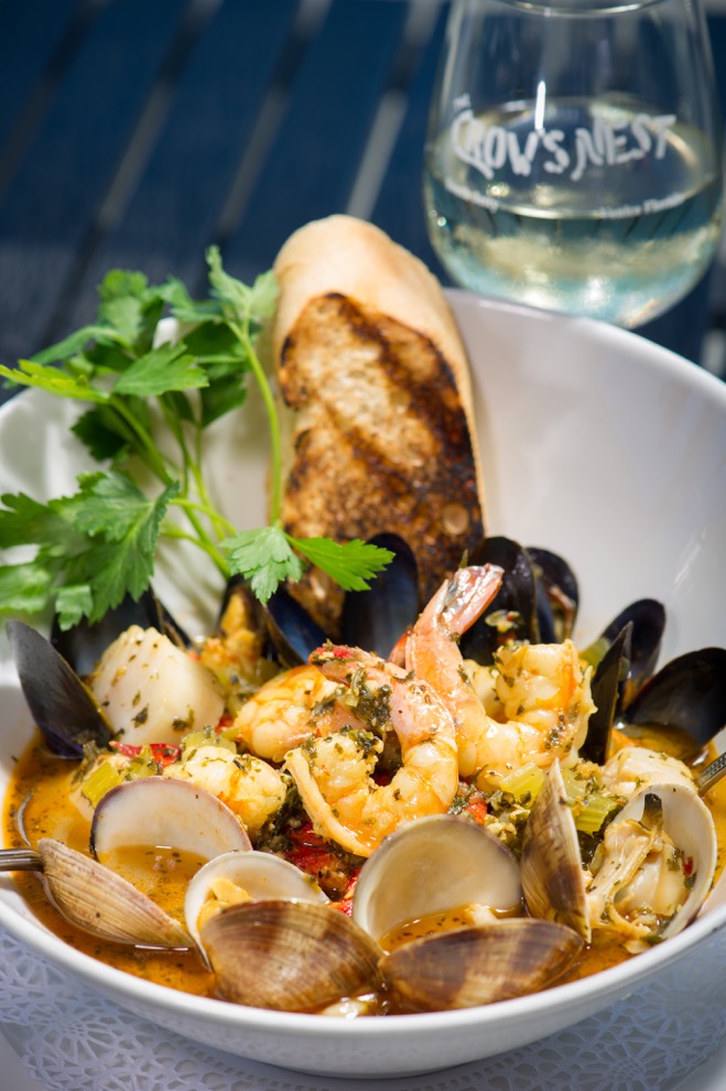 Bouillabaisse and a glass of wine make for the perfect evening.