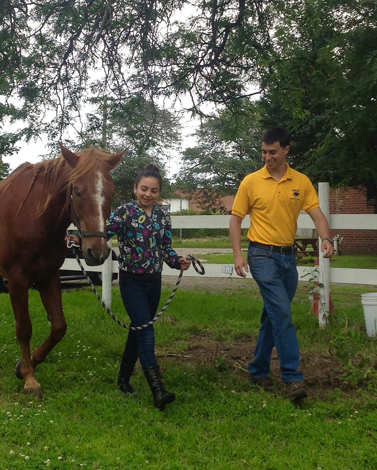 David working with a student. Photo by Madeline Flood