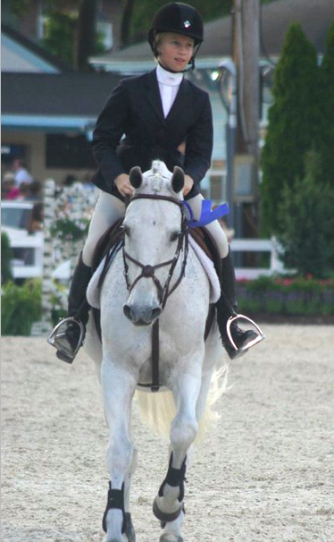 Victory gallops run in the family - Lucy and Wiseguy take a victory gallop at Devon. Photo by Kathleen Fisher