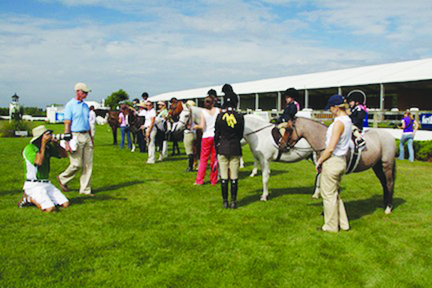 After two years of being held on Grand Prix Sunday, the Hampton Classic’s incredibly popular Leadline Class (more than 100 entries!) is moving back to Opening Day (Sunday, August 25). It moved in 2011 when Hurricane Irene forced cancellation of the Classic’s Opening Day and then stayed on Grand Prix Sunday last year. However, Opening Day gives the Leadliners a chance to ride in the Classic’s famed Grand Prix Ring and so the switch back has been made. Olympic Gold Medalist Joe Fargis is expected to return as judge! Photo by Gilda VanHecke