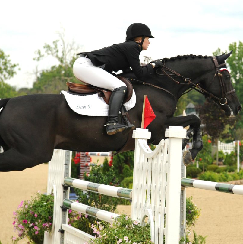 Jennifer on Lord Levisto at the North American Young Rider Championships Photo courtesy of JKG Farms 